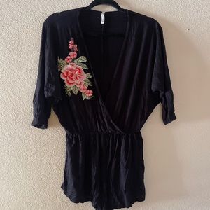 Black romper size M